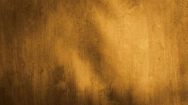 Rough golden brown painted wall texture with abstract brush strokes &ndash; grunge background for template or design use. blank texture background. copy space background, banner background. ads backgrounds,