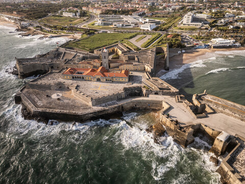 Beautiful aerial view to old historic fortress by ocean in Carcavelos