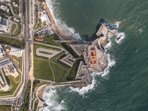 Beautiful aerial view to old historic fortress by ocean in Carcavelos