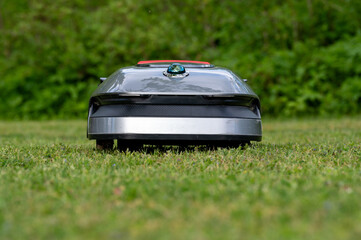 Robotic lawnmower without perimeter wire cutting perfect lawn