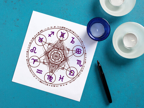 Creating a natal chart with zodiac signs and astrological symbols for horoscope interpretation