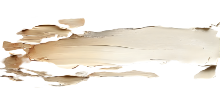 A close up view of a smear of beige paint on a black background with textured brush strokes visible