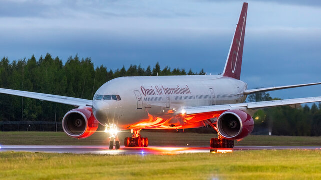 Reg:N819AX. Boeing 777-2U8(ER). Omni Air International.