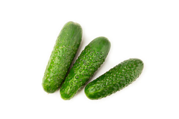 Cucumber isolated on white background. Slice of cucumber on white background. Fresh organic green cucumbers. Vegan. Ingredient for salad. Farm vegetables.