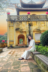 Vietnamese woman and landmark