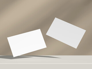 Stylish business card duo in minimalist floating layout on beige backdrop