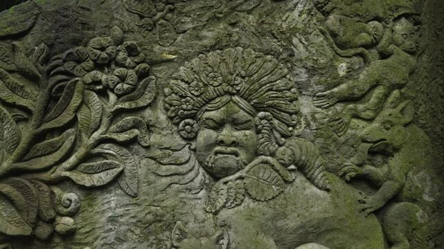 Ancient Balinese mythology sculpture carving in stone Bali Ubud Indonesia