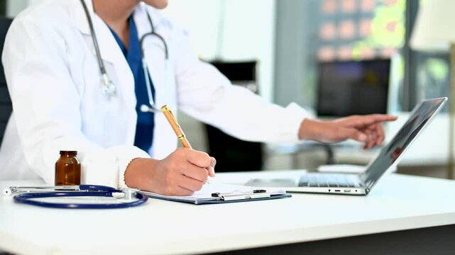 Medicine doctor hand working with digital tablet computer interface as medical network concept