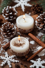 Cozy winter candle scene with cinnamon sticks and pinecones on wood for seasonal home decor and wellness inspiration

