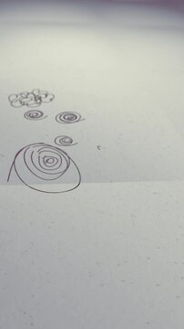 Graphic design concept animation: logo design process. Animation illustrating the process of designing a logo from concept sketches to final artwork. Vertical video.