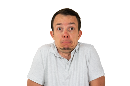 Man shrugging with wide eyes expressing shock or awkward surprise. Isolated portrait. Transparent png.