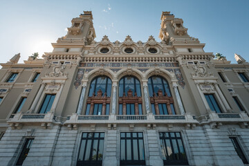 Obraz premium Detailed front facade of the Salle Garnier, the historic opera house inside the Monte Carlo Casino in Monaco, showcasing Belle Époque architecture with intricate carvings, arched windows