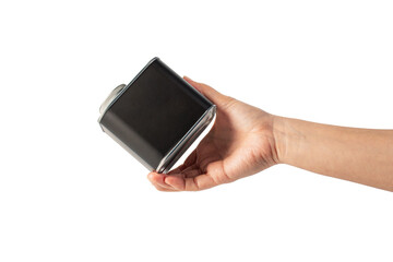 Black can for packaging in hand on transparent background.