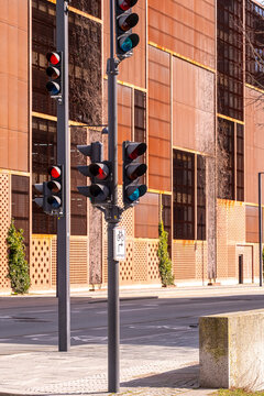 Traffic lights in front of modern buildings in &Oslash;restad, Copenhagen, showcasing urban design, architecture, and city infrastructure for business, real estate, and editorial visuals.