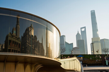 Morning sunrise of Reflax ofHistorical architecture on the bund of Shanghai in window and  Shanghai city modern skyscraper cityscape with reflection of buildings in city Shanghai, China