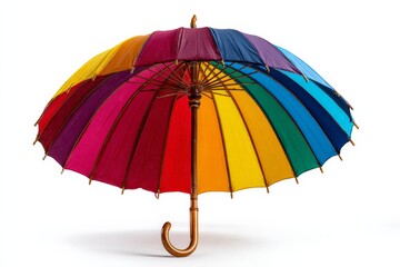Vibrant rainbow umbrella in an indoor setting with a classic design and wooden handle creating a cheerful atmosphere