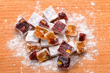 Sweet food Turkish delight, assorted rahat locum in form of cubes with nuts and powdered sugar, traditional food