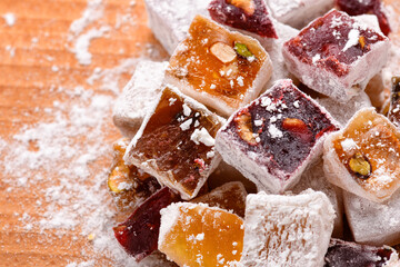 Sweet food Turkish delight, assorted rahat locum in form of cubes with nuts and powdered sugar, traditional food
