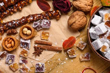 Sweet food Turkish delight on wooden background, assorted locum and candy for decorated backdrop