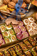 Sweet food Turkish delight on wooden background, assorted locum and candy for decorated backdrop