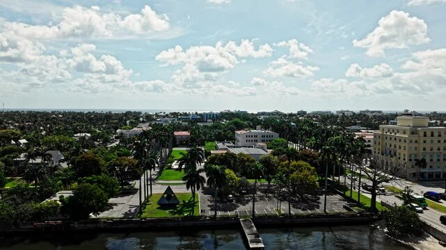 Aerial: downtown West Palm Beach residential zone during the day in Florida, USA, establishing drone shot