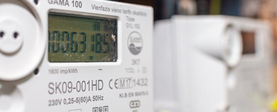 Close-up of smart electric power meter, digital display power usage, modern smart grid residential device, indoors, selective focus, technology concept. Telsiai, Lithuania. 05-26-2025.