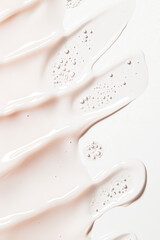 Obraz premium Smooth, creamy texture of a light pink substance, perfect for beauty or food-related themes and concepts.