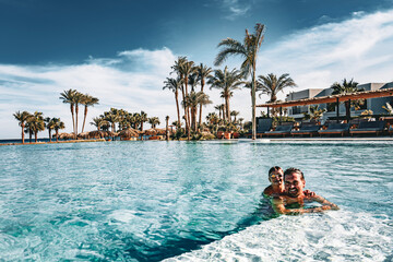 Photo from Hurghada in Egypt son and father in pool