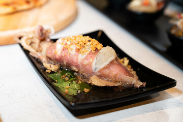 Deep-Fried Egg Squid with Fish Sauce Dressing (Pla Muek Kai Tod Rad Nam Pla) - Authentic Thai Seafood