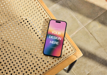 Mockup Of Customizable Smartphone On Chair