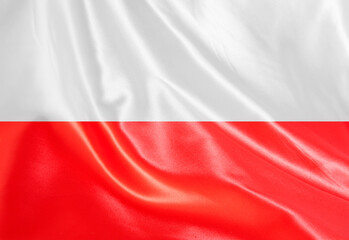 Digital composite..Polish flag on satin material, ..
