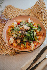 Salad with dressing and fresh vegetables