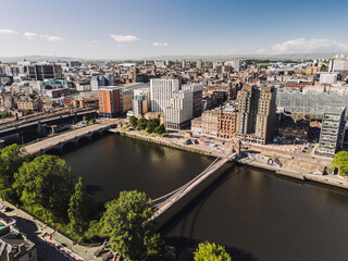 Glasgow Scotland: 18th May 2025: Drone view of Glasgow skyline on River Clyde with Bridgeon a sunny day aerial view
