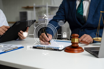 Teamwork of business lawyer meeting working hard about legal legislation in courtroom to help their...