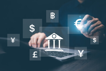 Businessman  holding virtual world with currency sign for forex exchange and global money transfer by technology concept.
