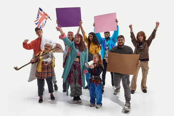 People shout holding protest signs and flags, showing anger and demand for justice against white...