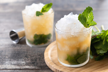 Classic Mint Julep Cocktail on wooden table