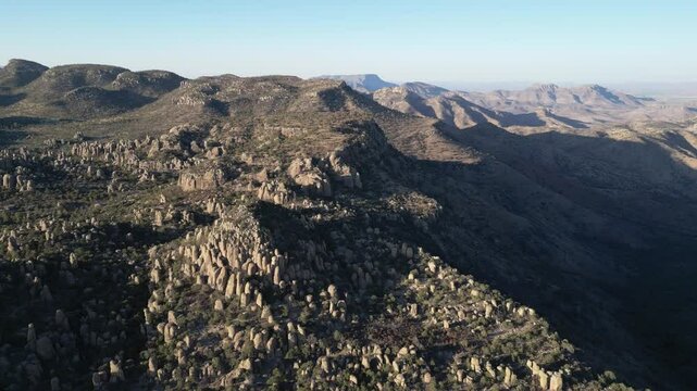 Rocky peaks and valleys at Valle de los Monjes, Creel, in golden morning light