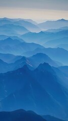 Fototapeta premium Blue-Toned Layered Mountain Landscape, Natural Scenery Background for Wallpaper, Landscape Design, Art Creation