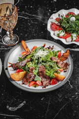 Salad with dressing and fresh vegetables