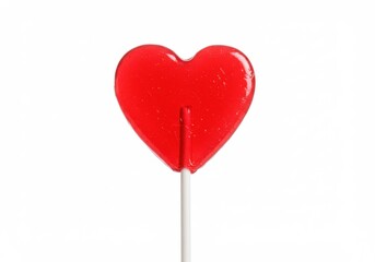 Red heart shaped lollipop on white background