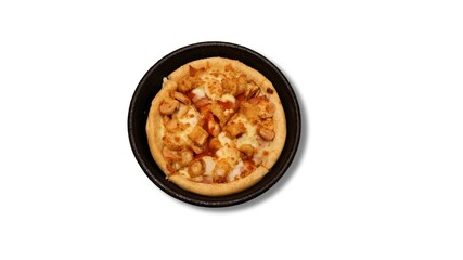 Pizza served on a hot plate isolated on a white background with copy space.