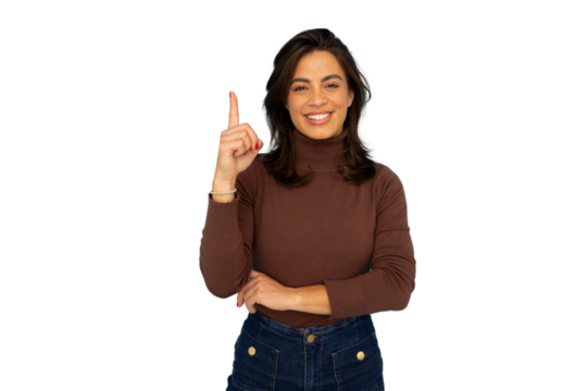 Smiling woman raising her index finger against a transparent background, conveying confidence and positivity in a studio portrait setting