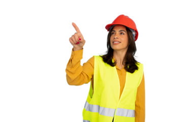 Confident female engineer in safety vest, hardhat, pointing upward against transparent background