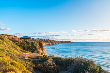 Port Willunga coastline with jetty remains during sunset time, Fleurieu Peninsula, South Australia