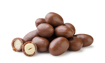 Pile of chocolate covered peanuts and two halves close-up on a white. Isolated