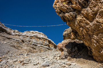Trekking route in Himalaya highlands in Nepal. A way from Thorung Phedi to Thorung high camp.