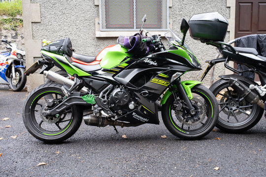 Ballymoney, Northern Ireland - May 24th, 2025: Green black Kawasaki Racing 650 Ninja motorbike parked outside, no people