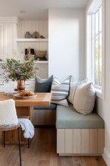 A cozy window seat nook in a light-filled kitchen.