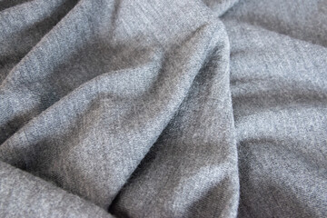 Gray wool or cashmere texture fabric or cloth textile.